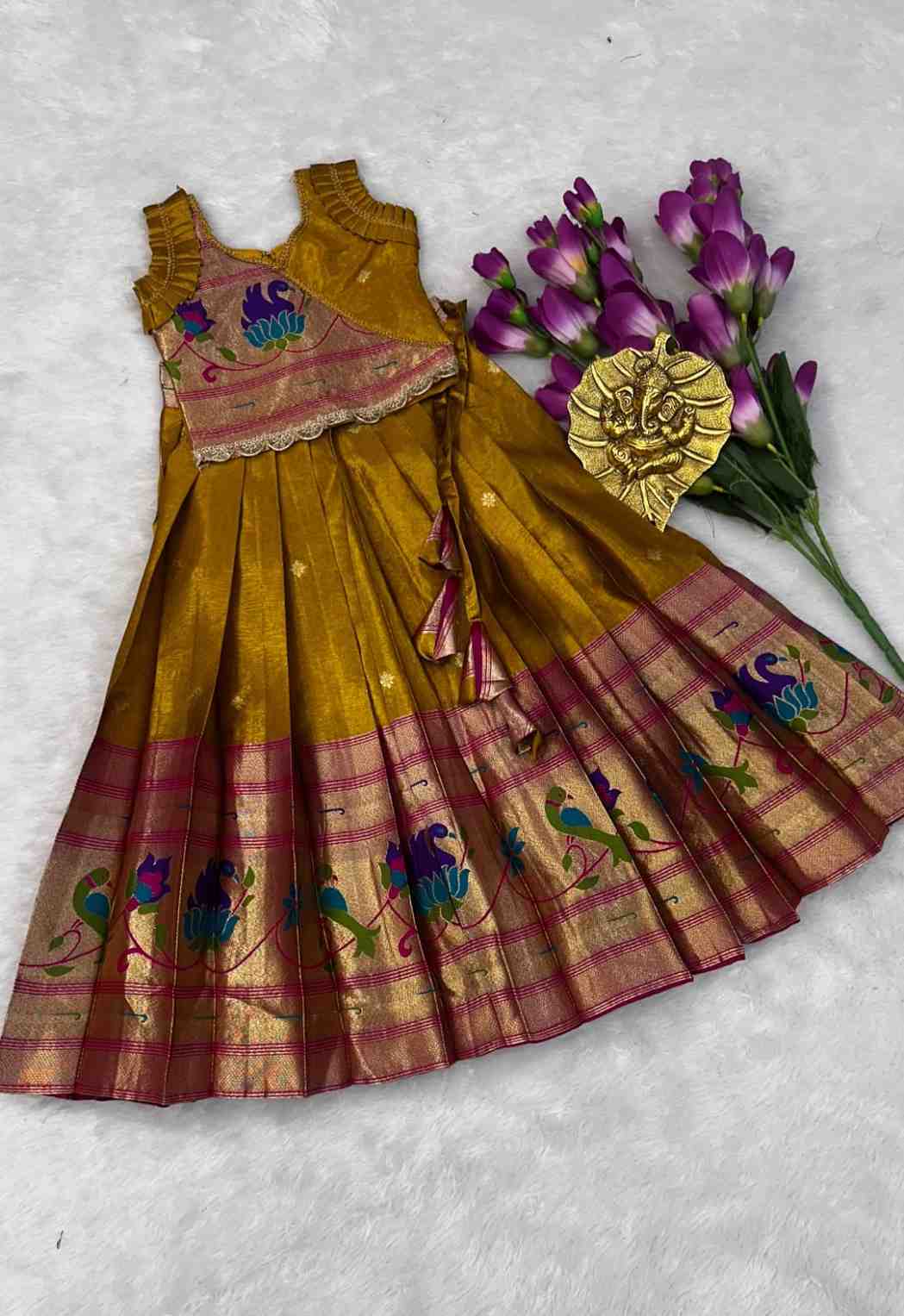 Kids shimmer Paithani silk lehengas by Arhas Couture