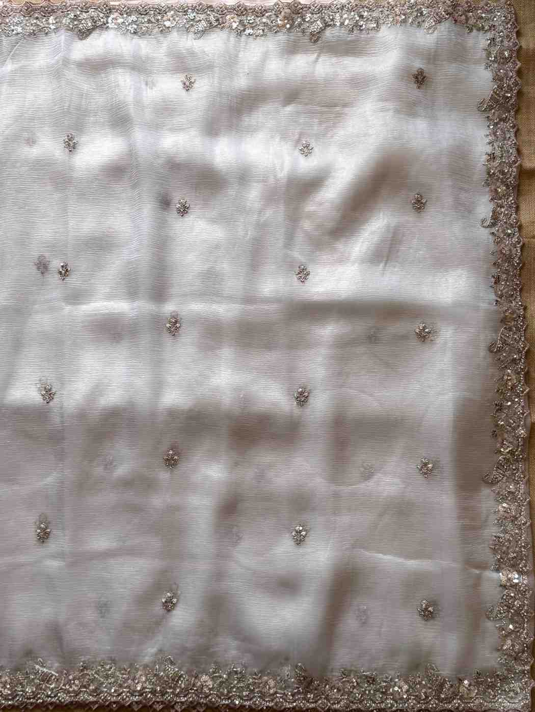 Fancy nylon tissue crepe sarees by Arhas Couture