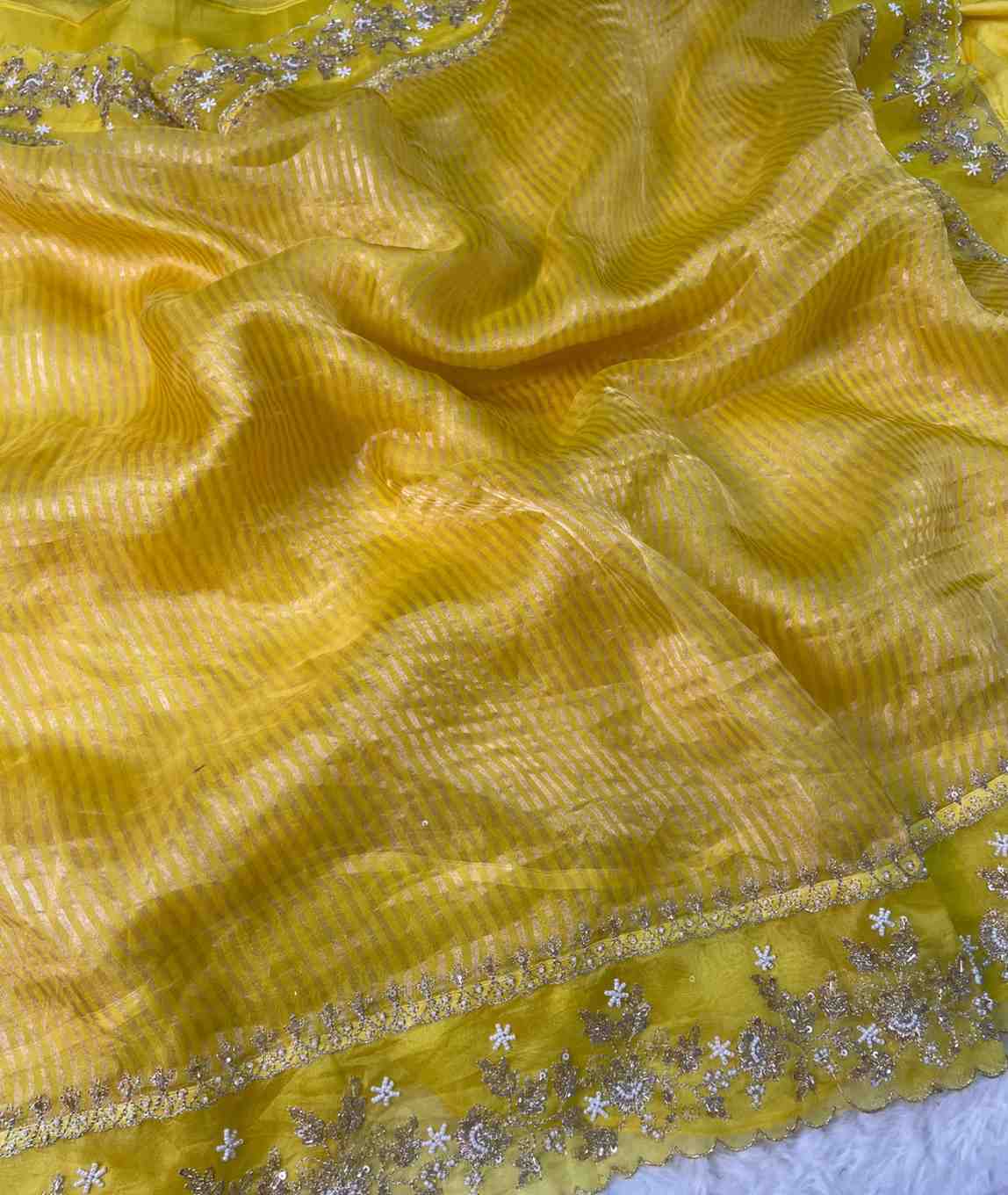 Fancy Banarasi Kora tissue silk sarees by Arhas Couture