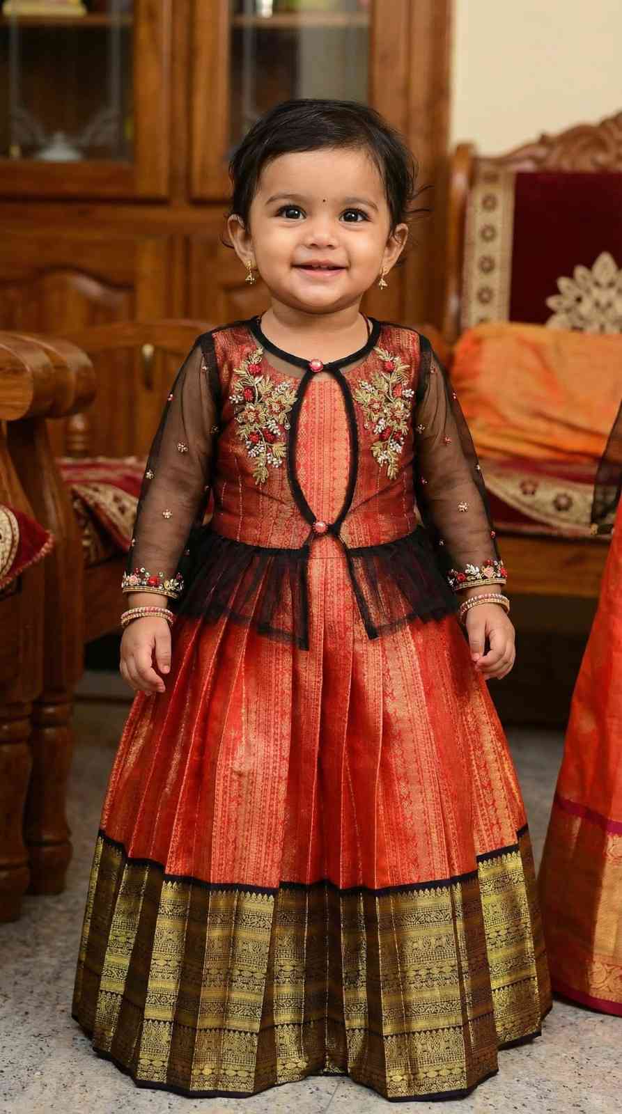 Semi Kanchi pattu family outfits by Arhas Couture