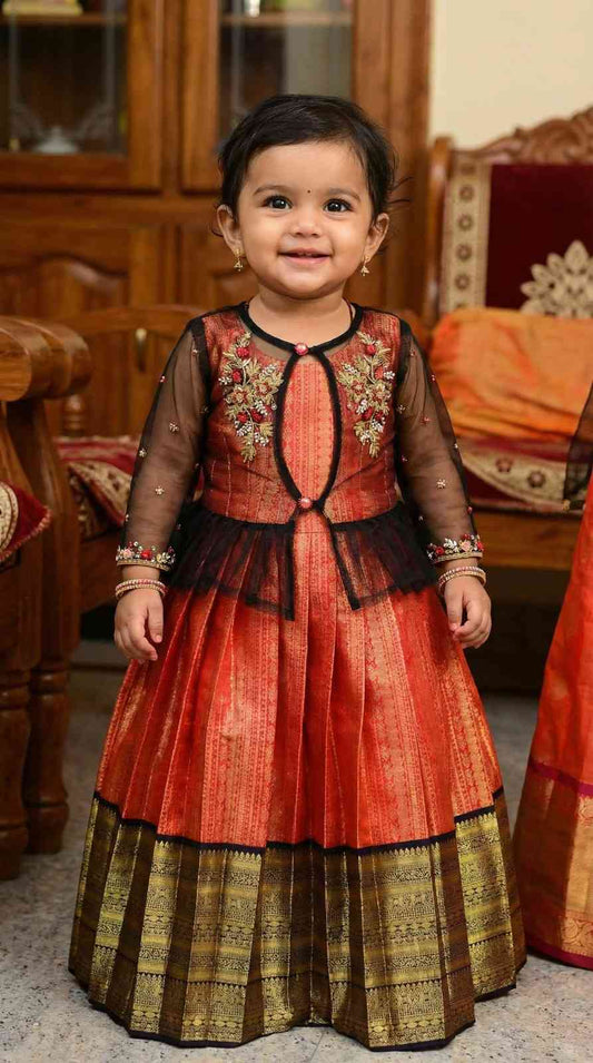 Semi Kanchi pattu family outfits by Arhas Couture
