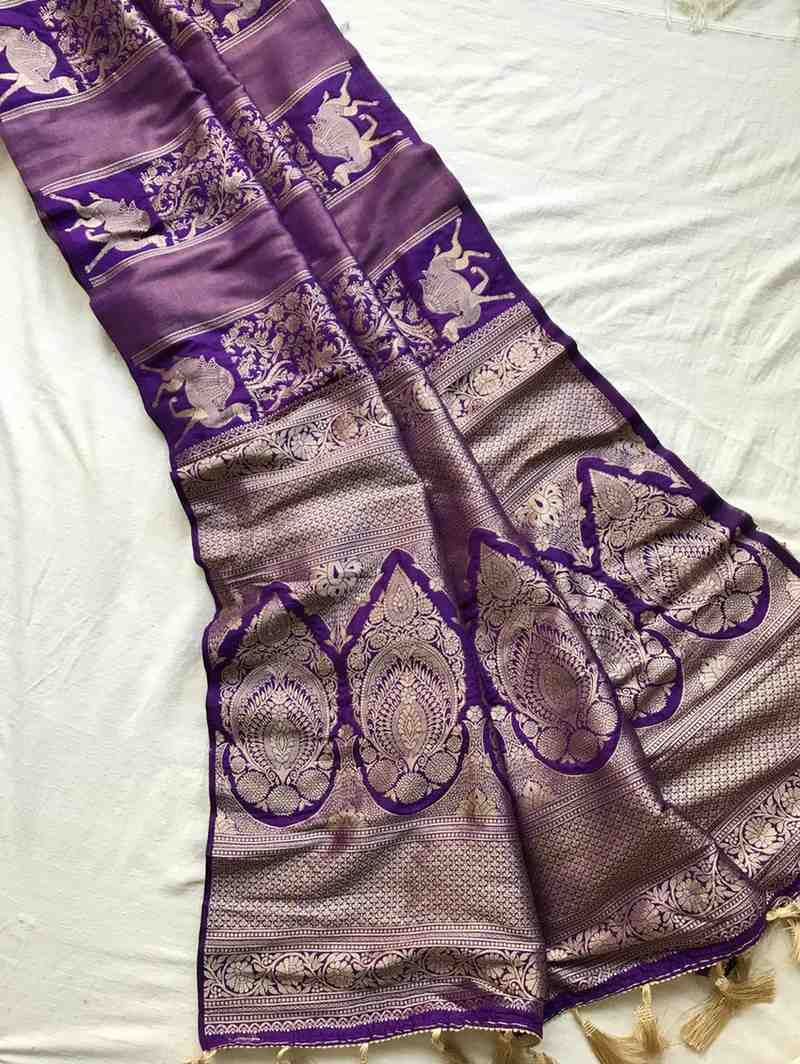 Fancy Banarasi Dola tissue saree with stripe weaves and tassels pallu – Arhas Couture
