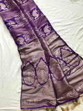 Fancy Banarasi Dola tissue saree with stripe weaves and tassels pallu – Arhas Couture