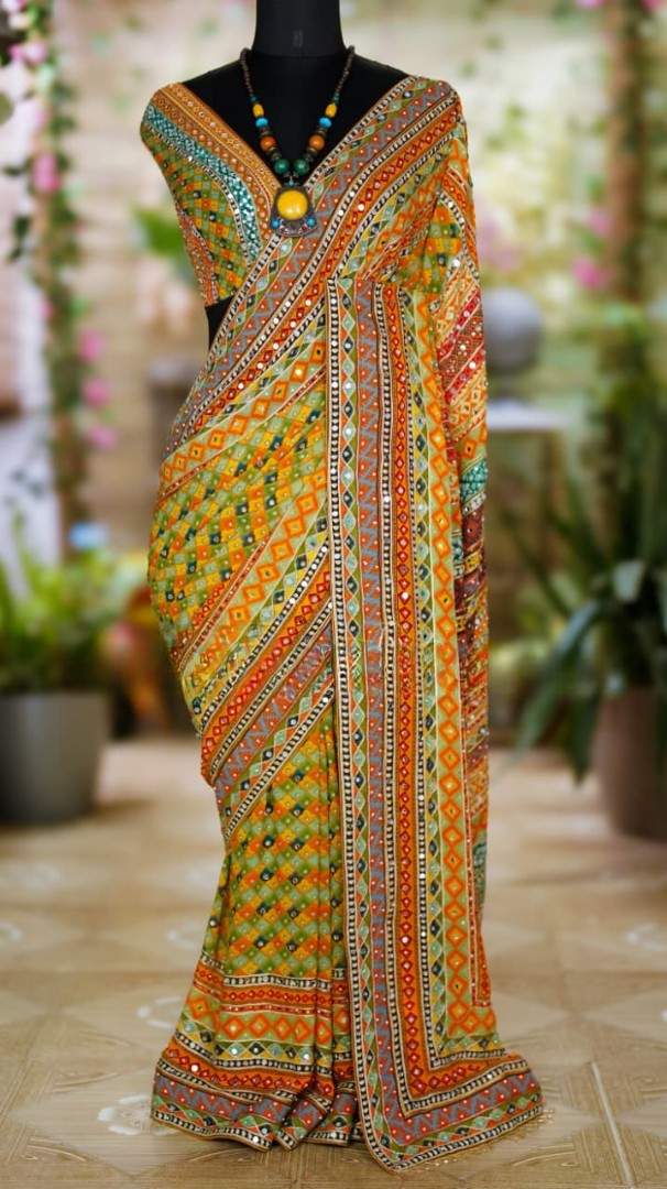 Fancy Georgette designer saree with geometric prints and mirror work – Arhas Couture