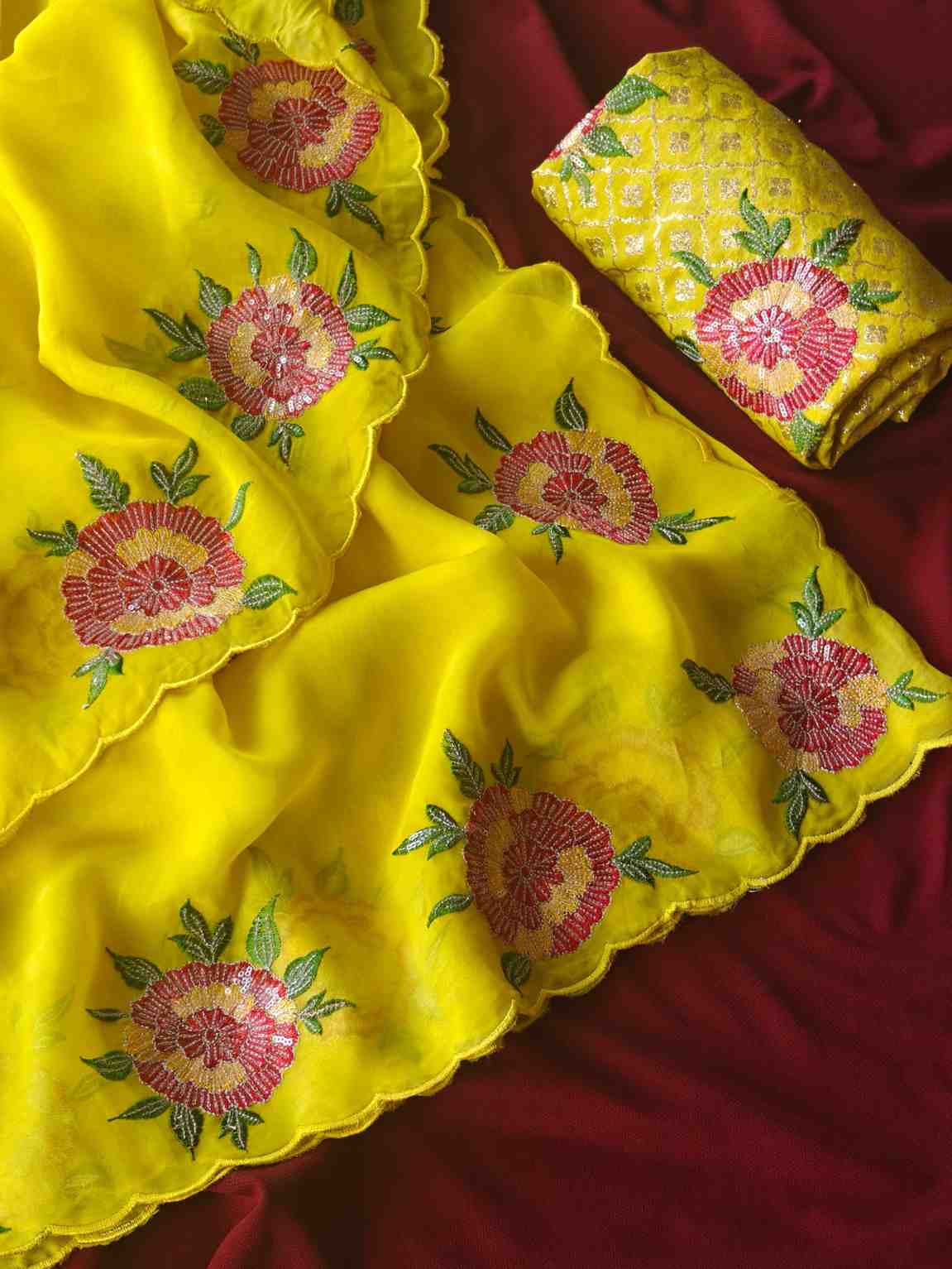 Fancy floral embroidery organza sarees by Arhas Couture